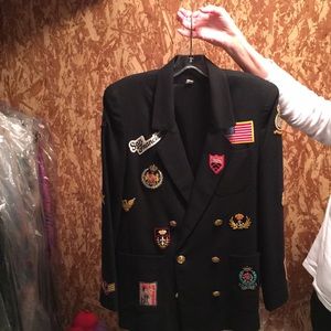 A black linen Blazer with multiple patches